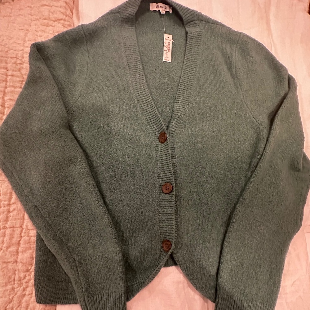 Hip length cardigan sweater